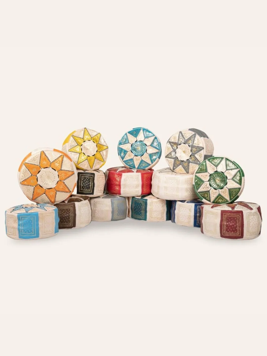 Moroccan leather poufs in different colors arranged together as home décor seating