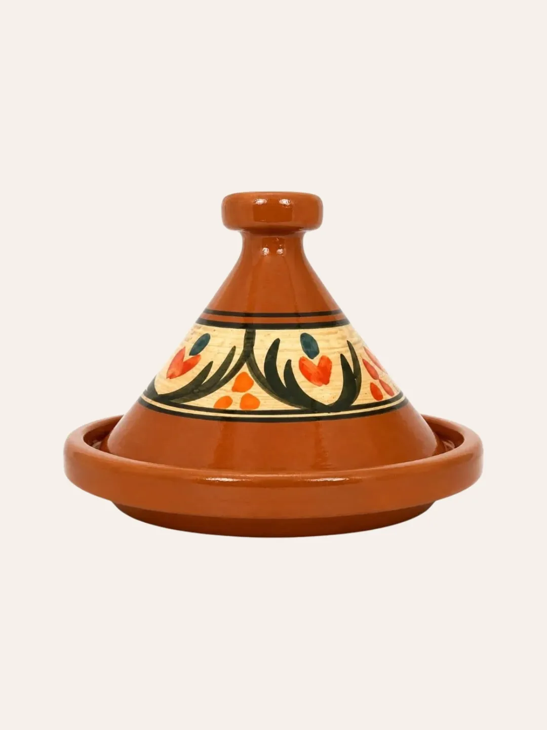 Front view of Moroccan ceramic tagine with colorful painted decorative pattern